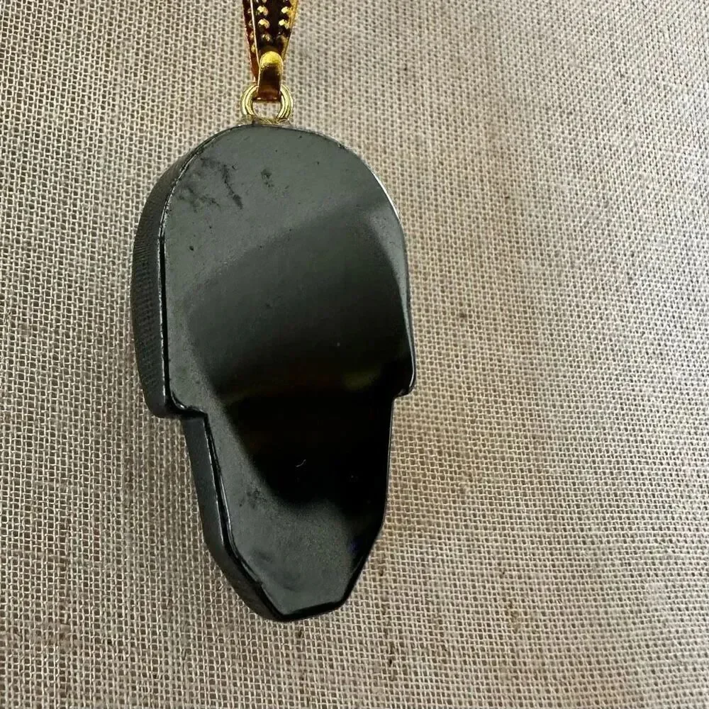 Hematite skull pendant necklace